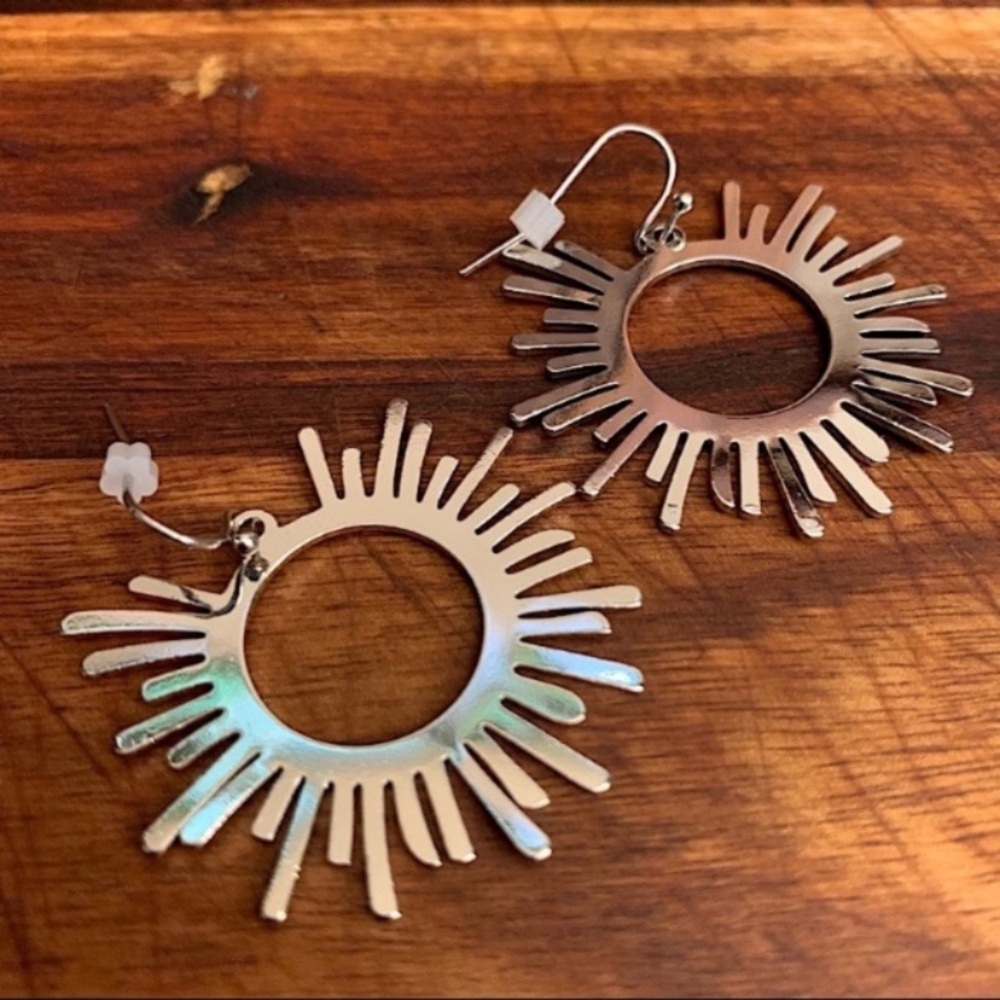 Metal Sunburst Dangle Earrings in Rhodium